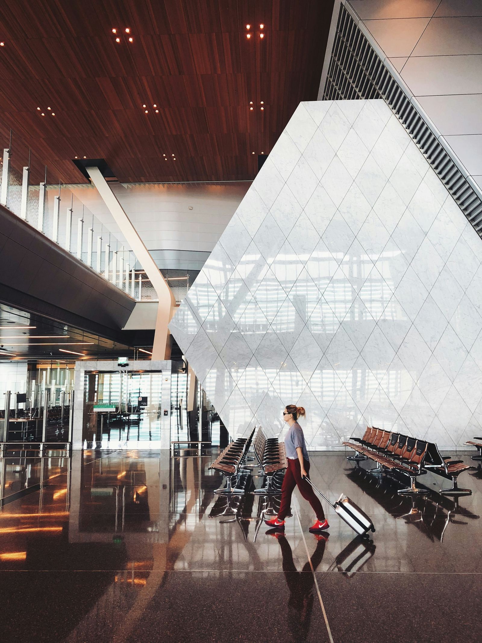 Traveller walking through an airport